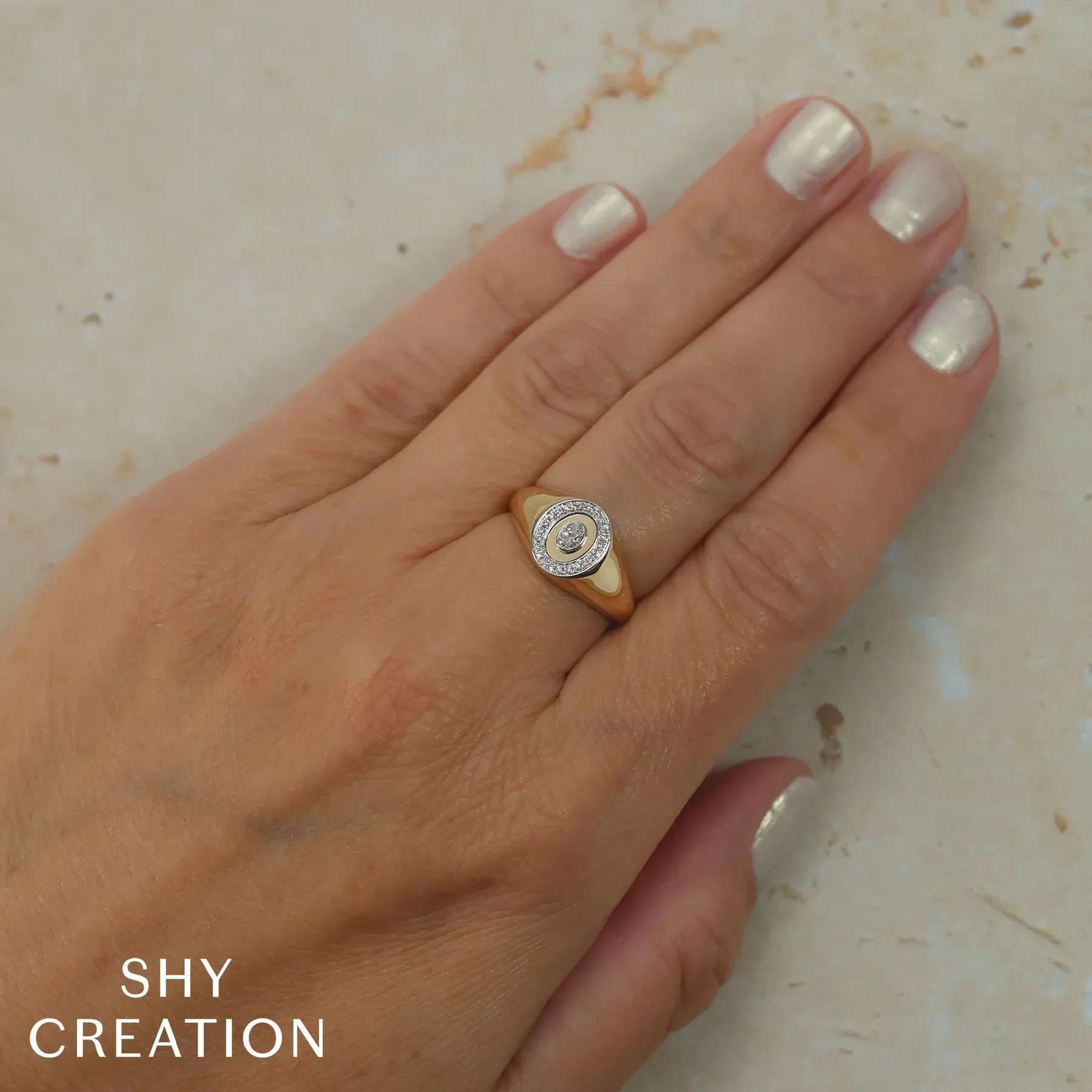 0.17ctw Diamond Oval Bezel Signet Ring
