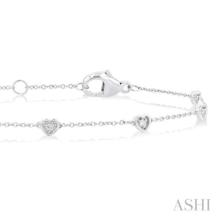 1/10 ctw Petite Heart Round Cut Diamond Station Bracelet in 10K White Gold