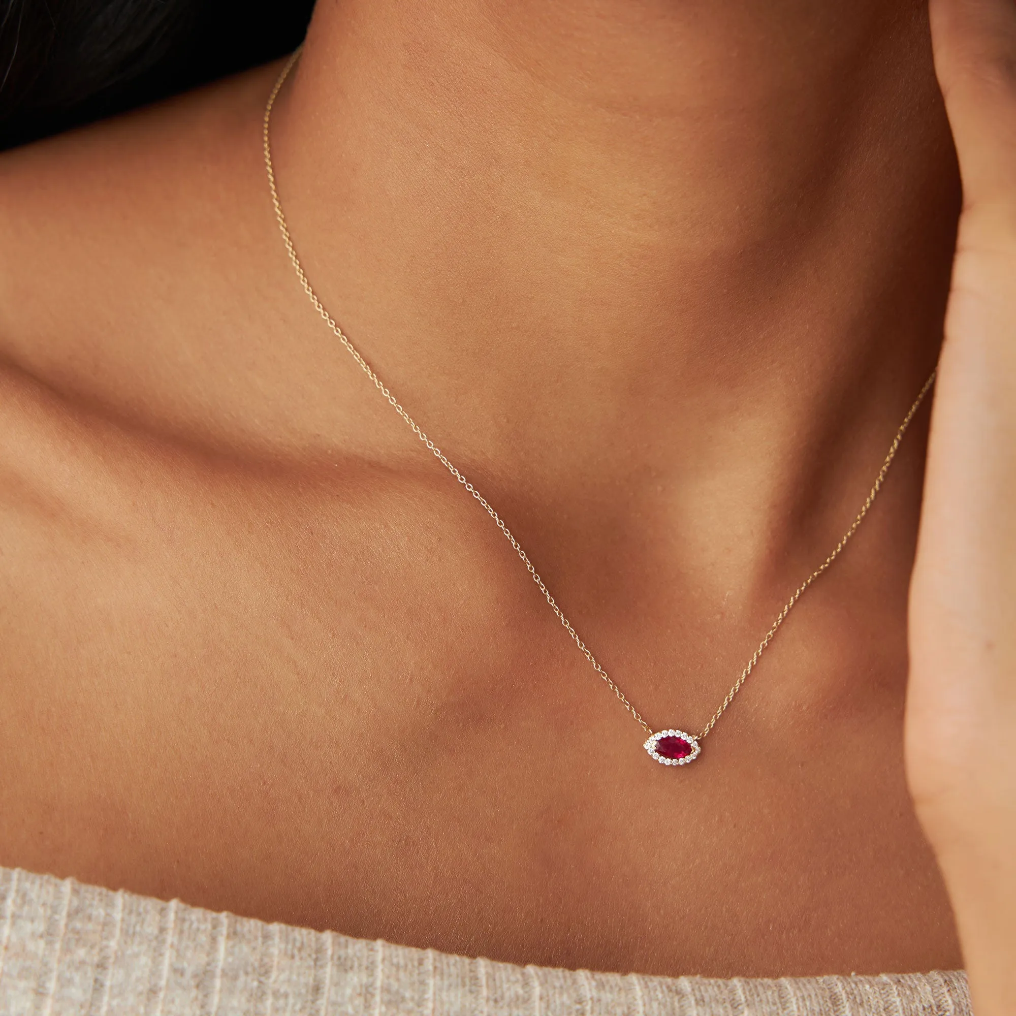 14k Marquise Ruby with Halo Diamond Setting