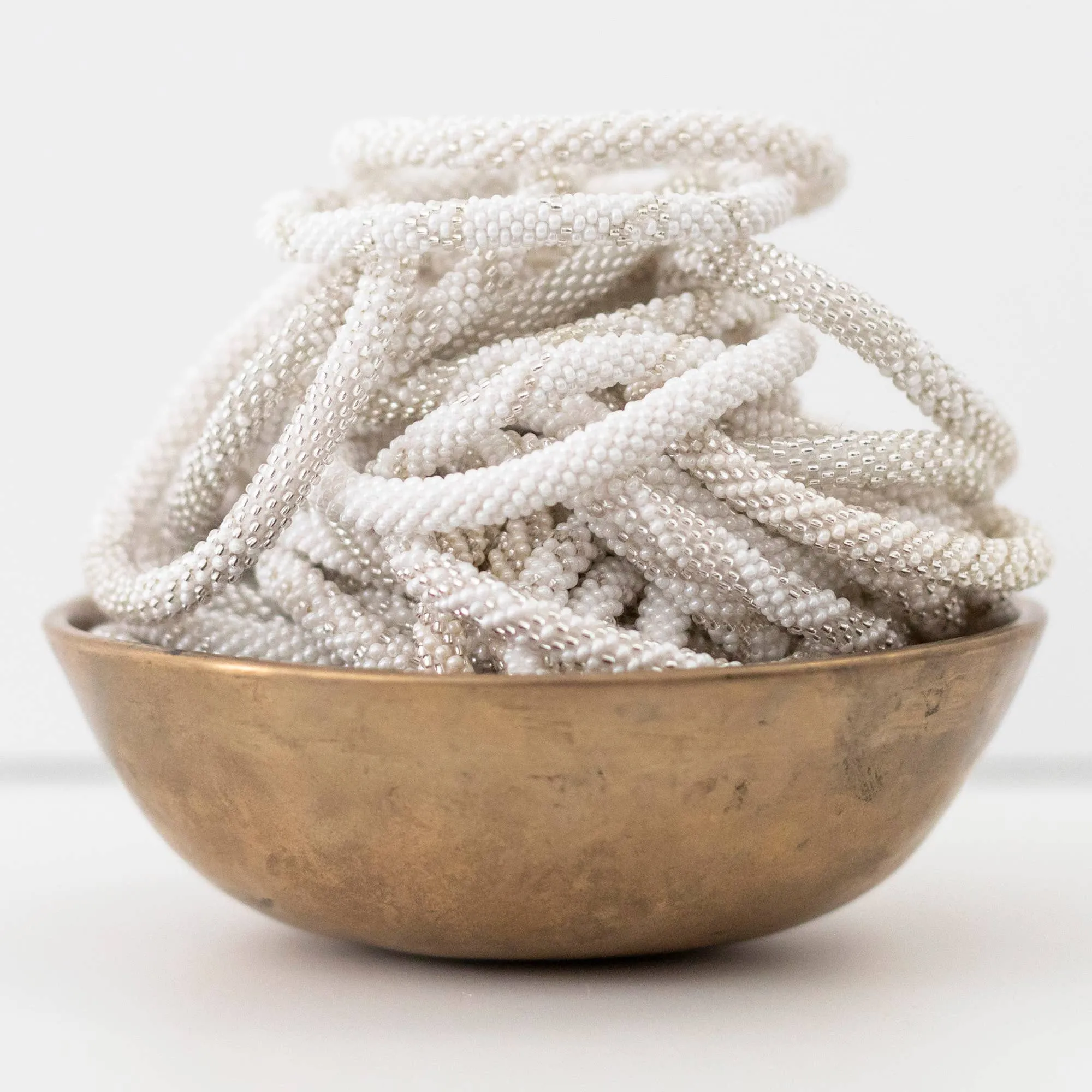 Aid Through Trade - Roll-On® Bracelets Pearl