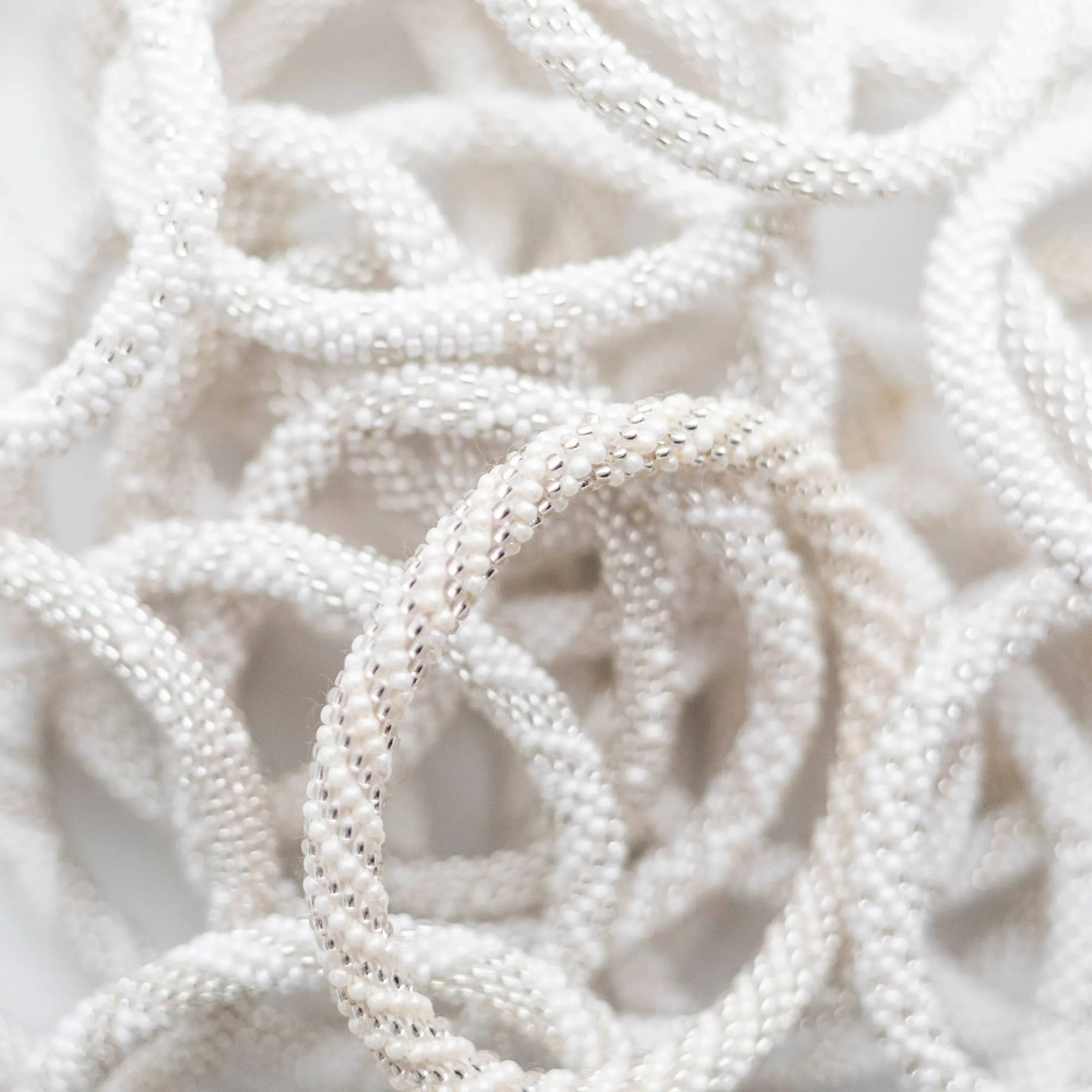 Aid Through Trade - Roll-On® Bracelets Pearl