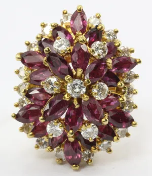 An 18k natural ruby and diamond cocktail ring featuring 5 carats of rubies and 1 carat of diamonds.
