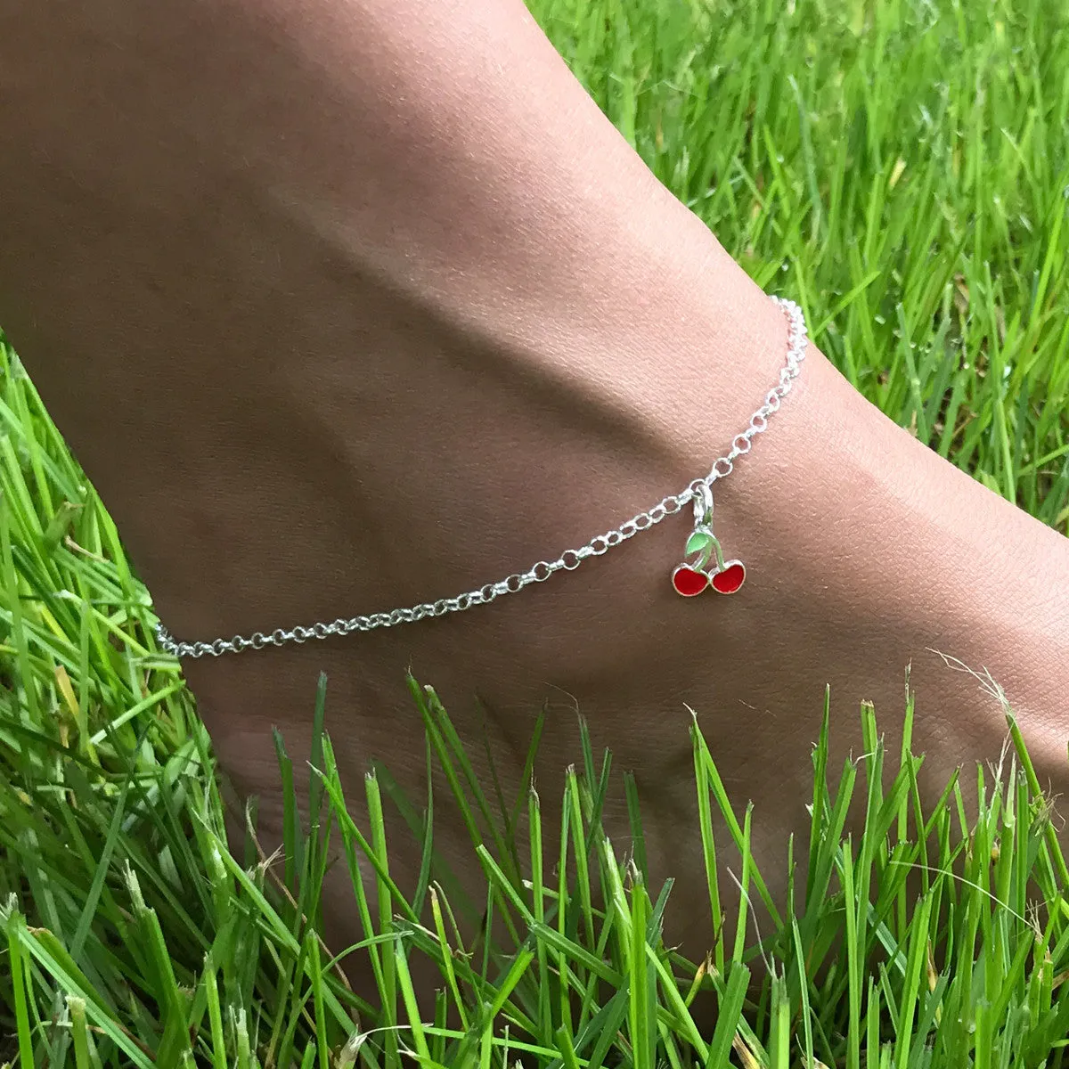 Delightful Sterling Silver Rolo Chain Anklet with a Cute Enamel Cherry Charm Adornment.