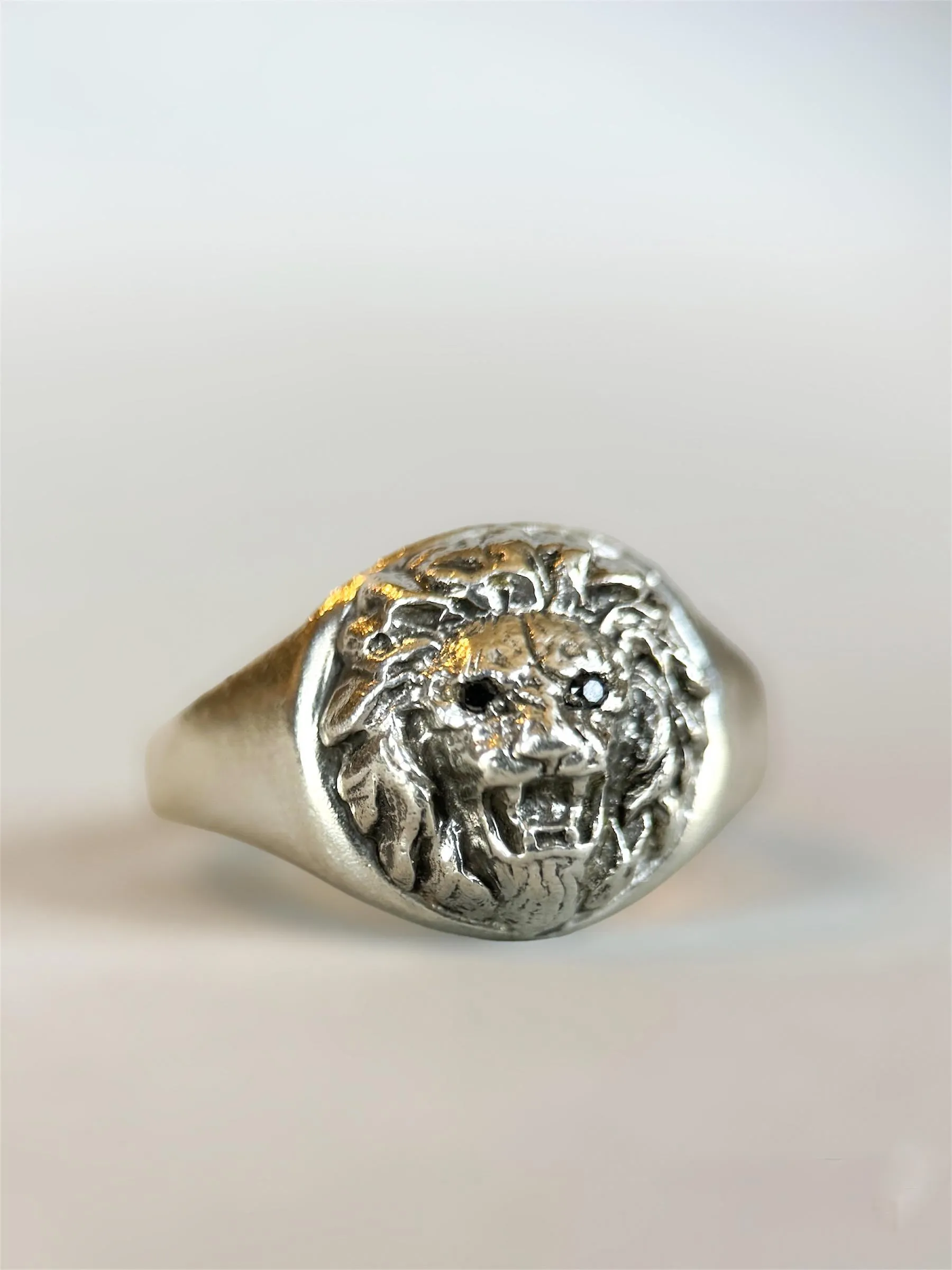 Lion Signet Ring with Black Diamond Eyes, sterling silver