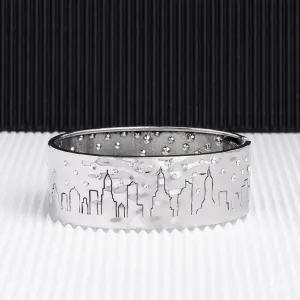 Starry Skyscrapers - White - City Skyline with Rhinestones Silver Paparazzi Hinged Bracelet - Empire Diamond Exclusive