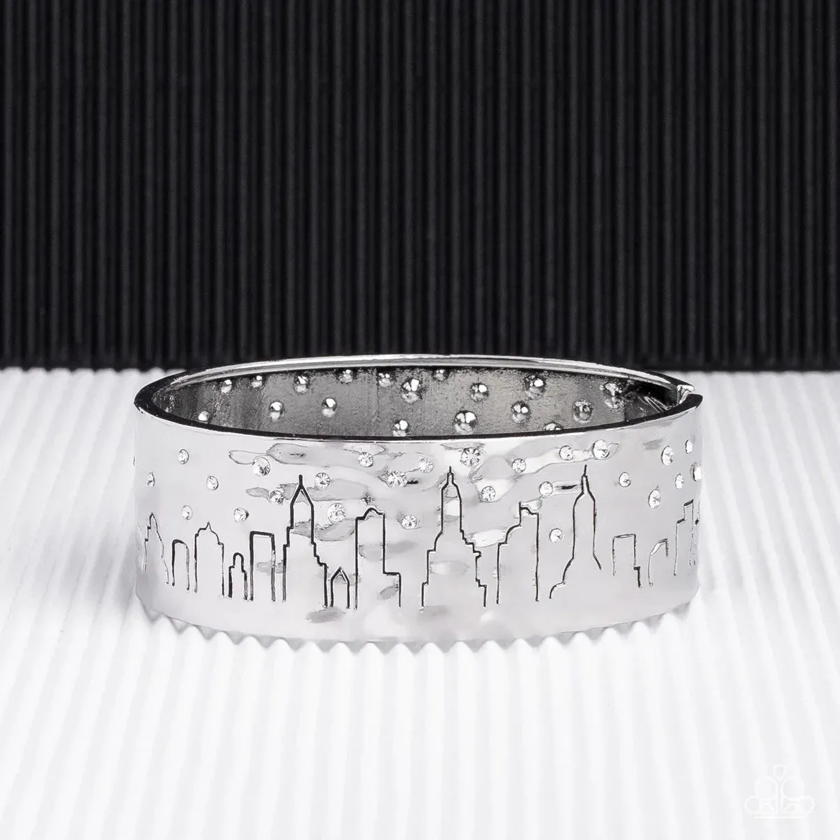 Starry Skyscrapers - White - City Skyline with Rhinestones Silver Paparazzi Hinged Bracelet - Empire Diamond Exclusive
