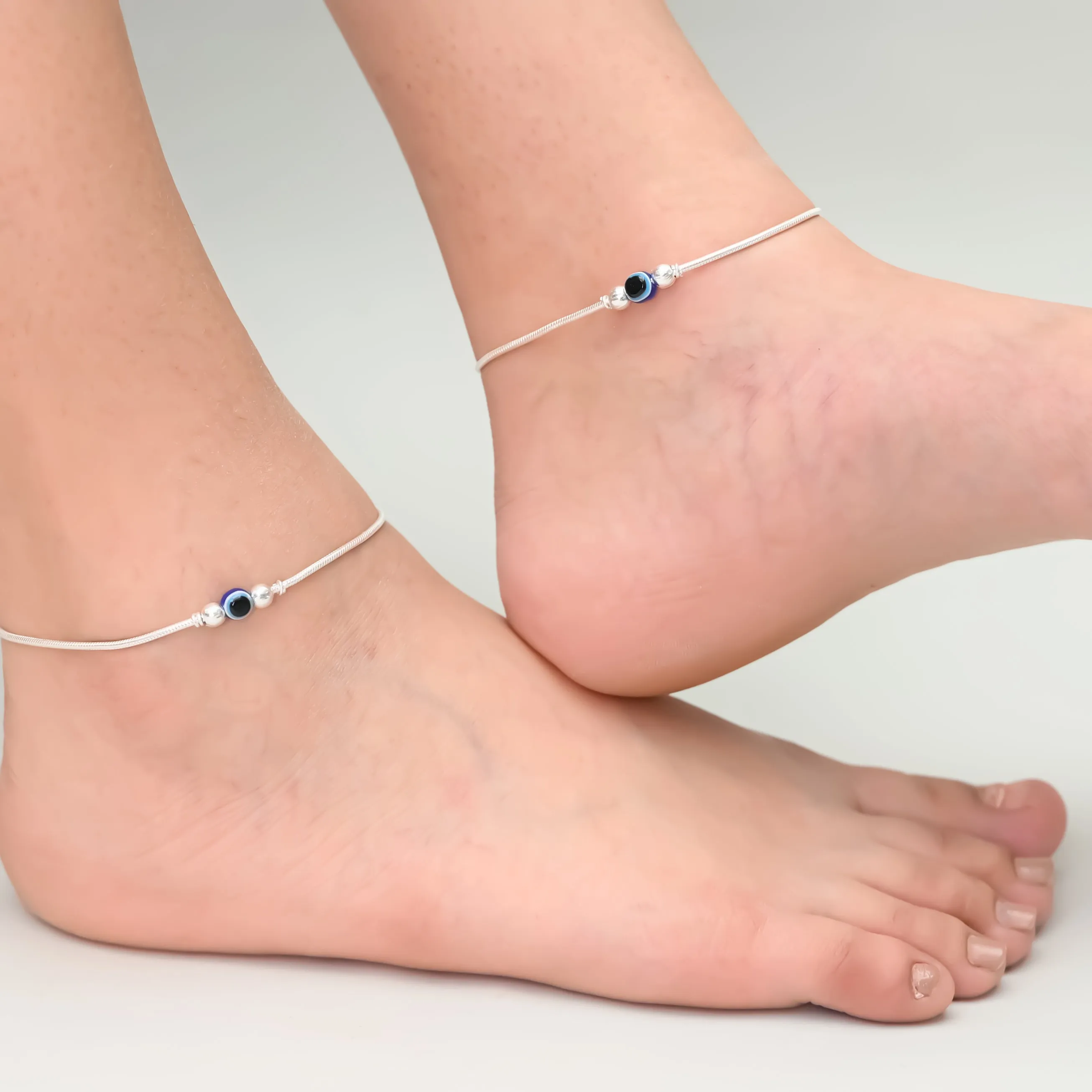 Stylish Silver Anklet Featuring Blue Evil Eye