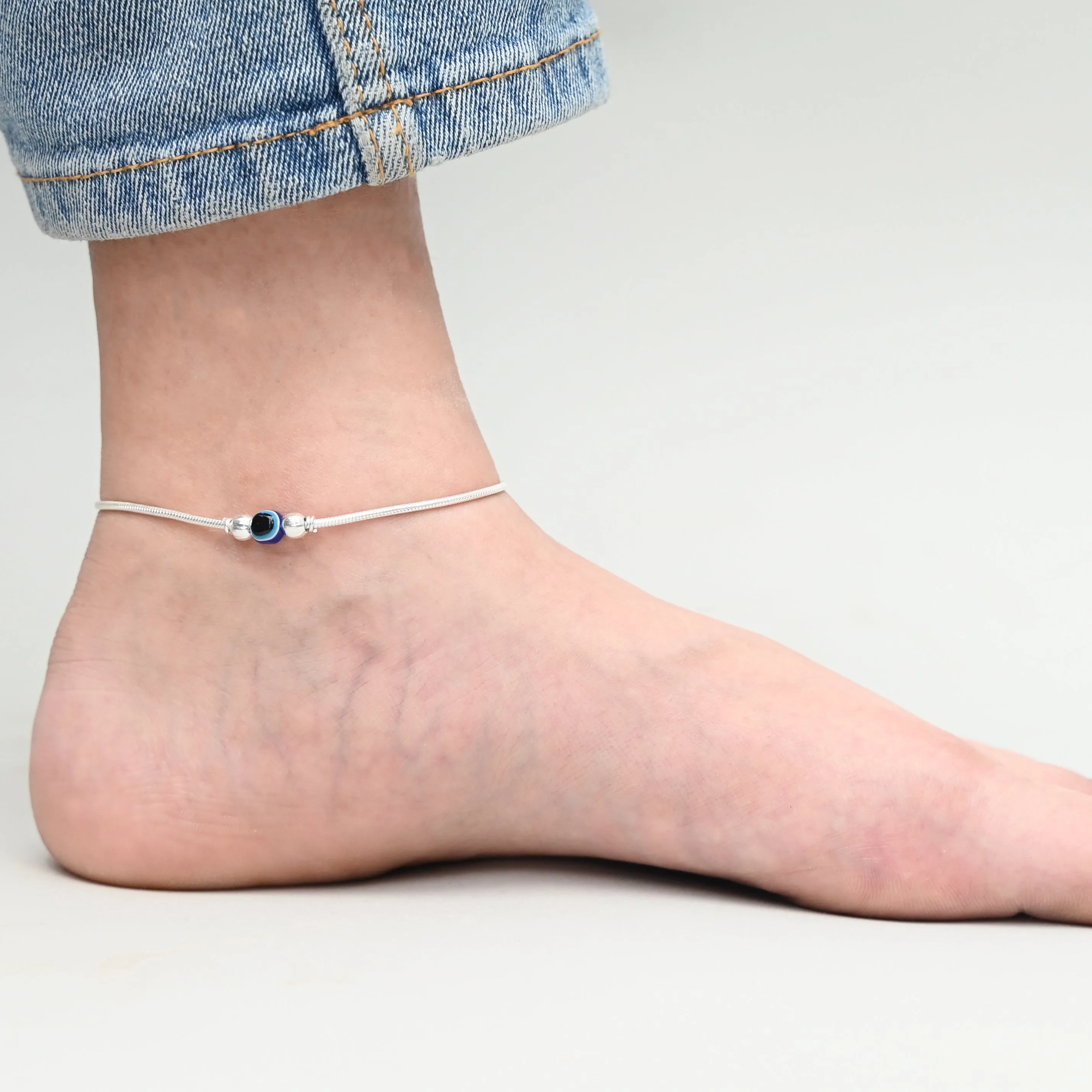Stylish Silver Anklet Featuring Blue Evil Eye