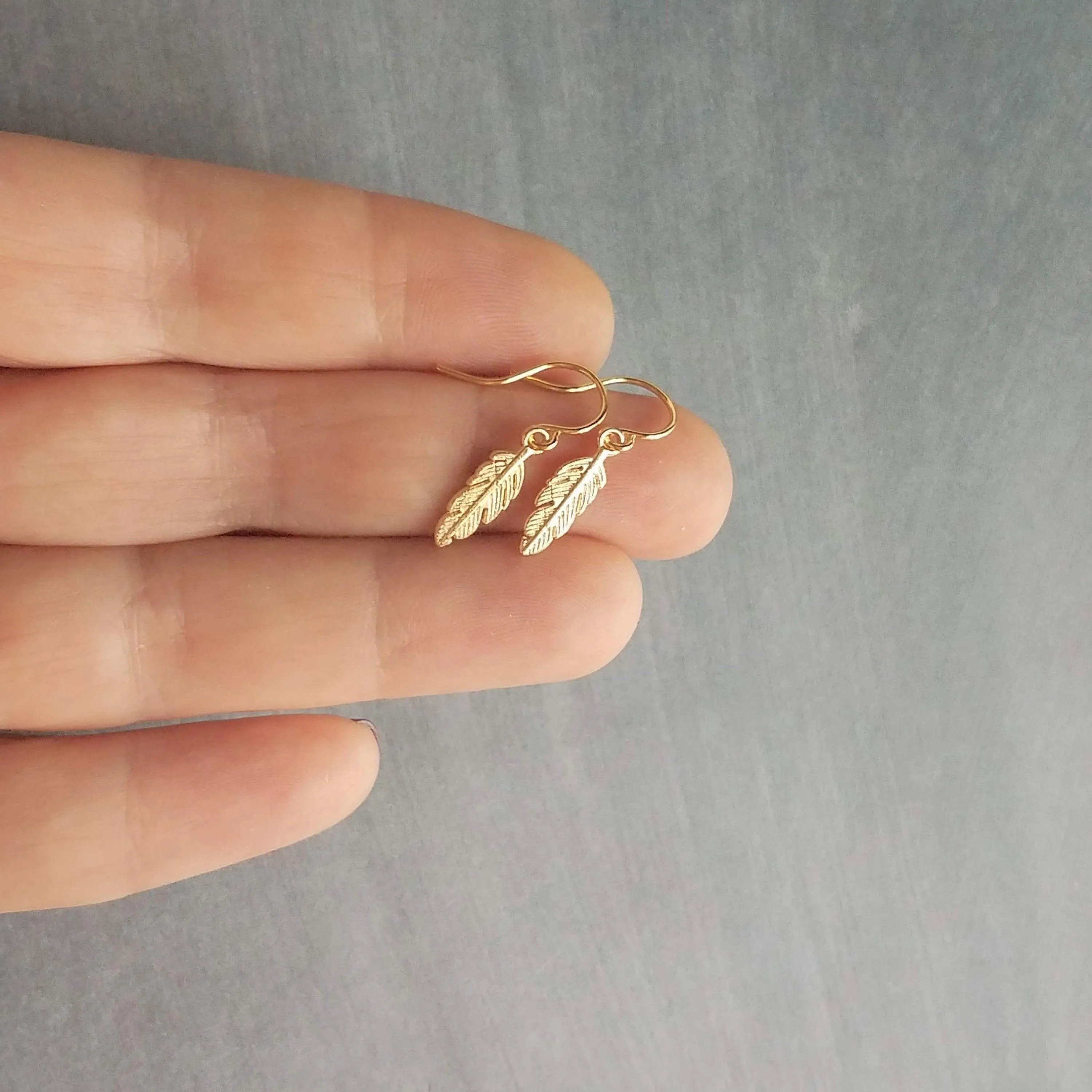 Tiny Gold Feather Earrings, small feather earring, tiny feather earring, gold feather charm, little feather dangle, simple gold feather
