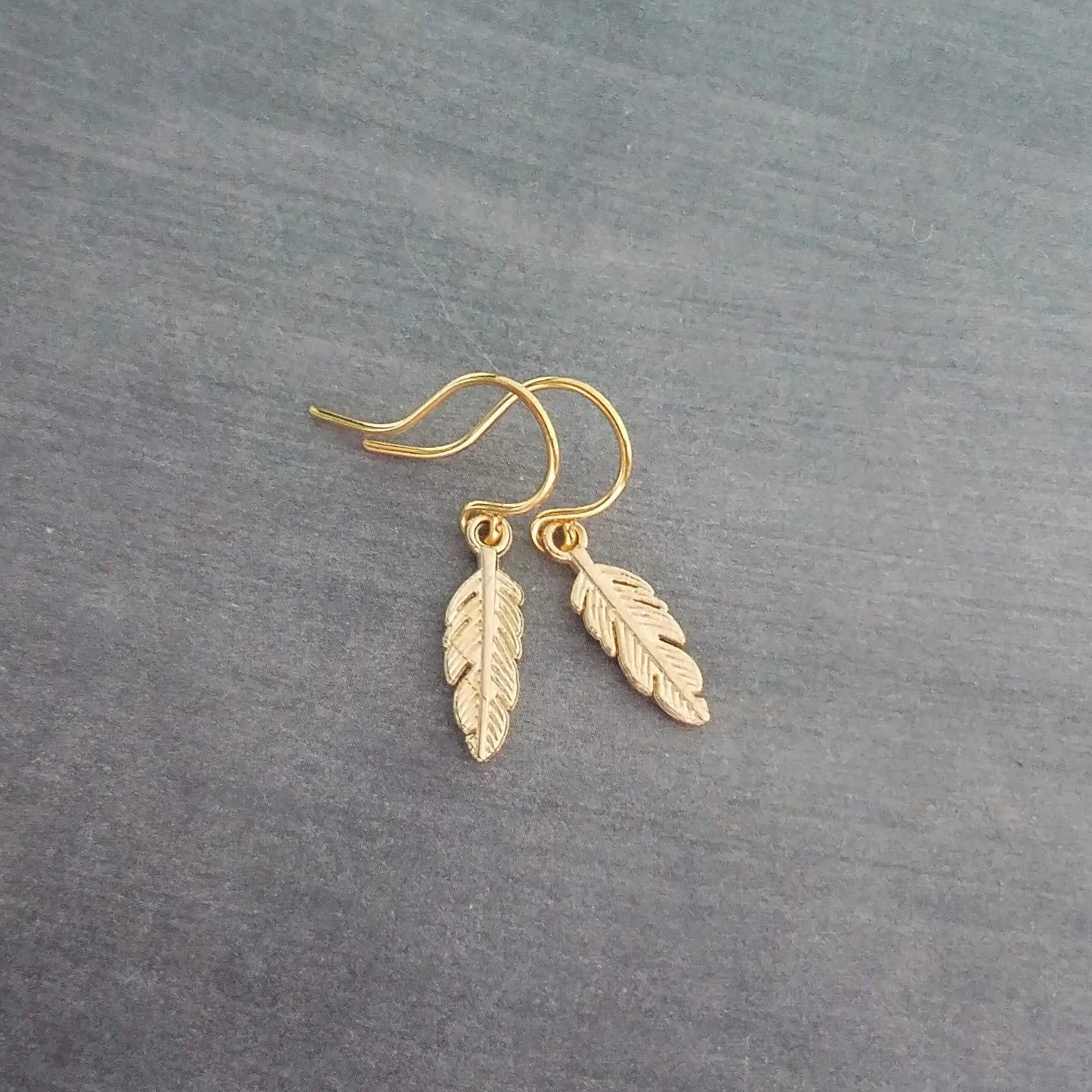 Tiny Gold Feather Earrings, small feather earring, tiny feather earring, gold feather charm, little feather dangle, simple gold feather