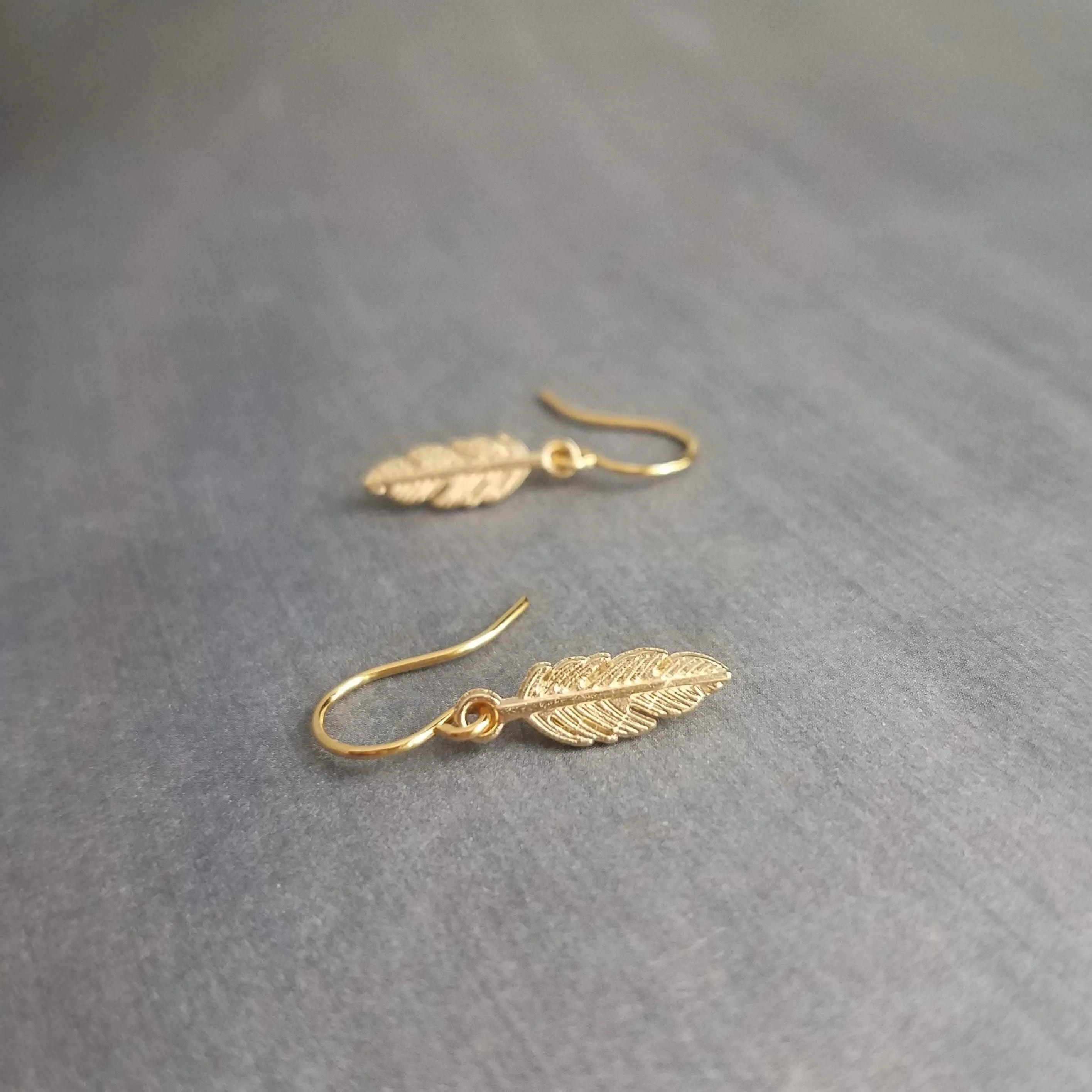 Tiny Gold Feather Earrings, small feather earring, tiny feather earring, gold feather charm, little feather dangle, simple gold feather