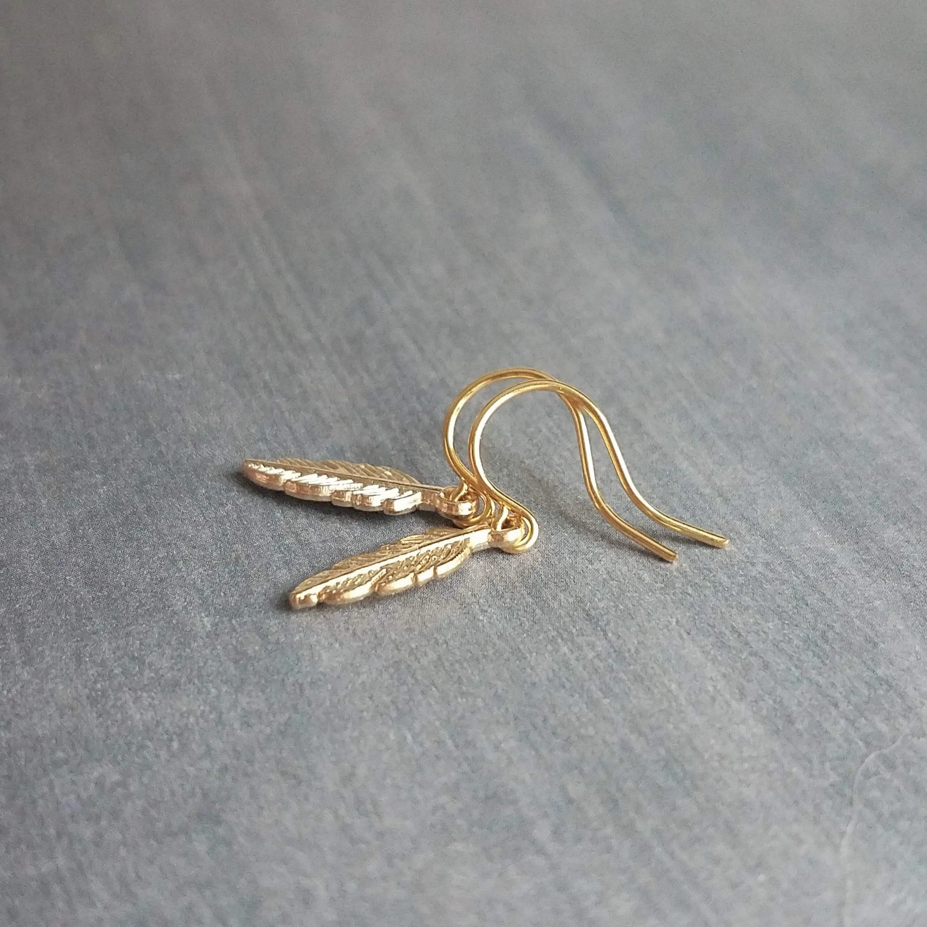 Tiny Gold Feather Earrings, small feather earring, tiny feather earring, gold feather charm, little feather dangle, simple gold feather